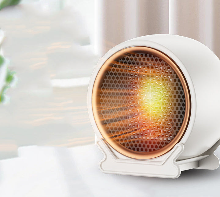 Compact round black ceramic fan heater