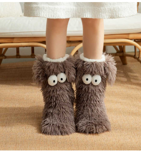 Fluffy snow socks with cartoon eyes