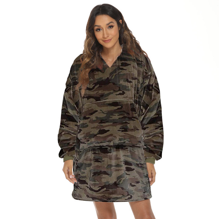 Person wearing oversized panda hooded blanket