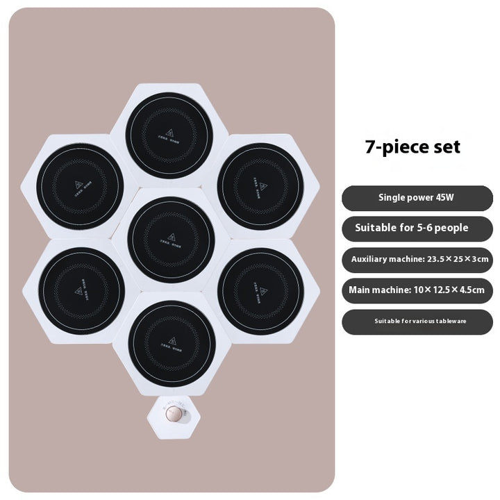 White hexagonal warming plates with dishes on top