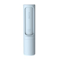 Pet hair remover brush on grey sofa