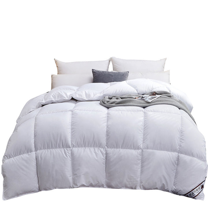 Quilted winter duvet on a bed