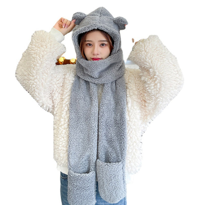 Woman wearing teddy hood scarf with bear ears