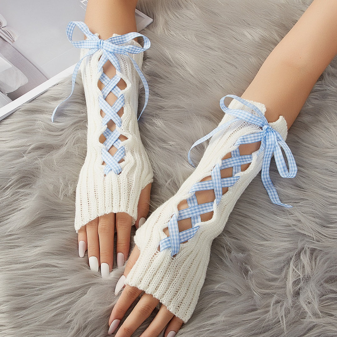 White long fingerless arm warmers with pink ribbon
