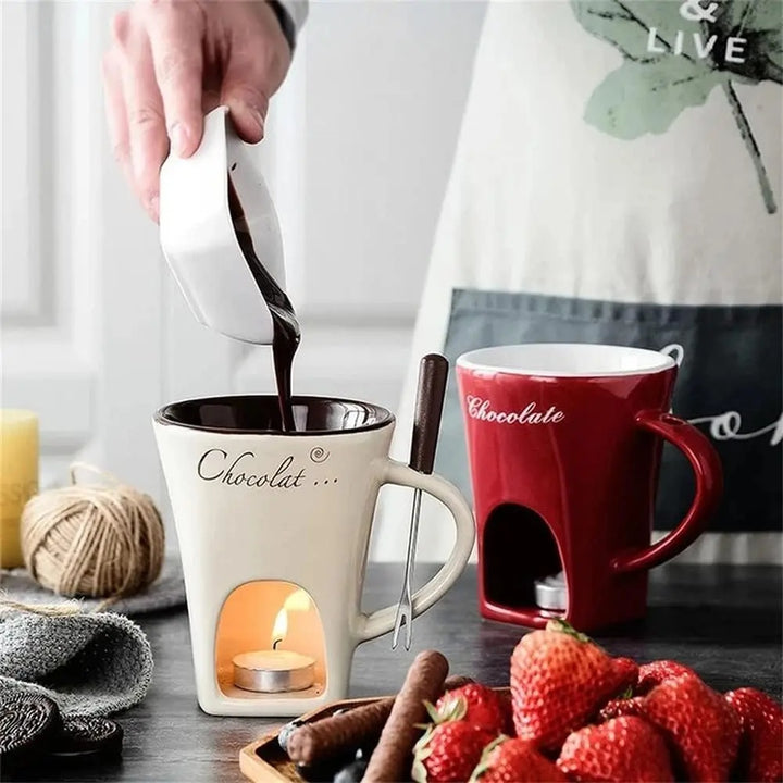 Ceramic fondue mug with fork and tealight