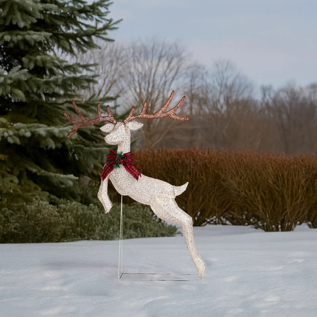 Light-up jumping reindeer with red bow
