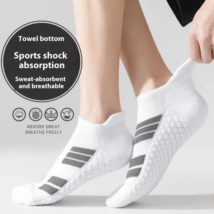 Ten pairs of white ankle sports socks