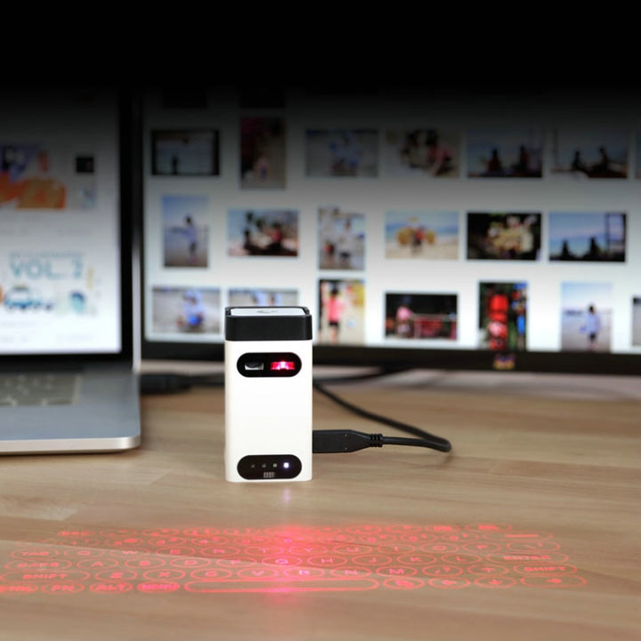 Laser projection keyboard on a desk
