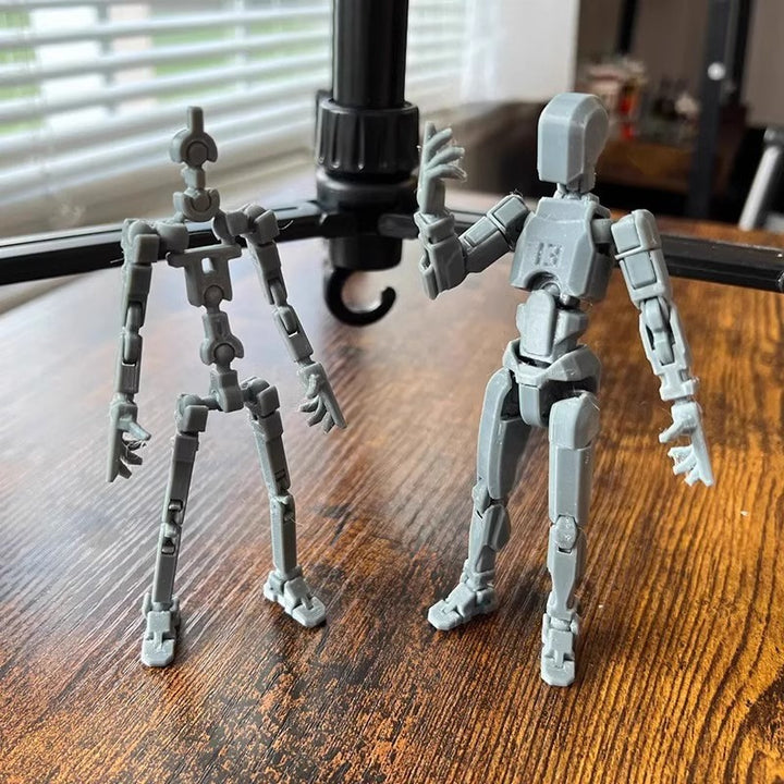 Poseable 3D printed robot figure on desk
