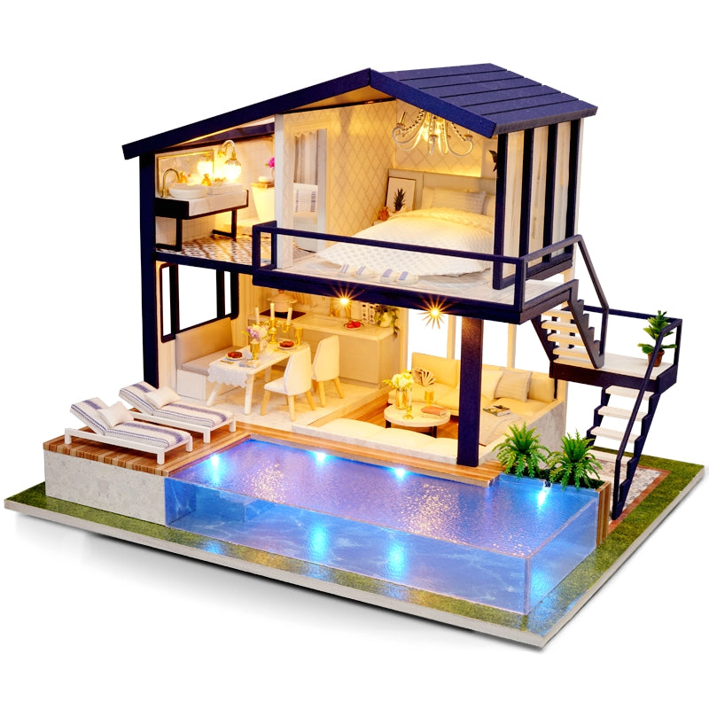 Finished miniature dollhouse with lights on