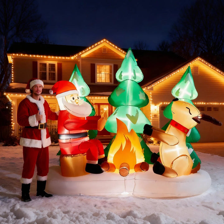 Inflatable Santa and reindeer around campfire