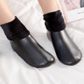 Black faux leather fleece lined slipper boots