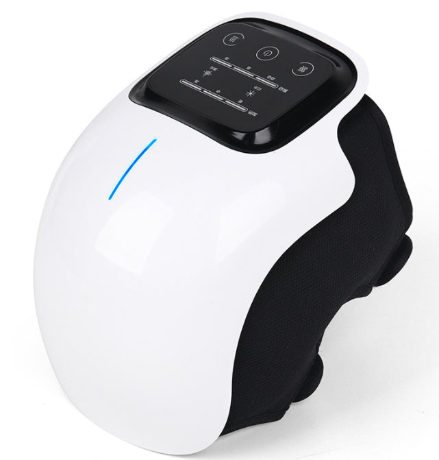 White cordless knee massager wrapped round a knee