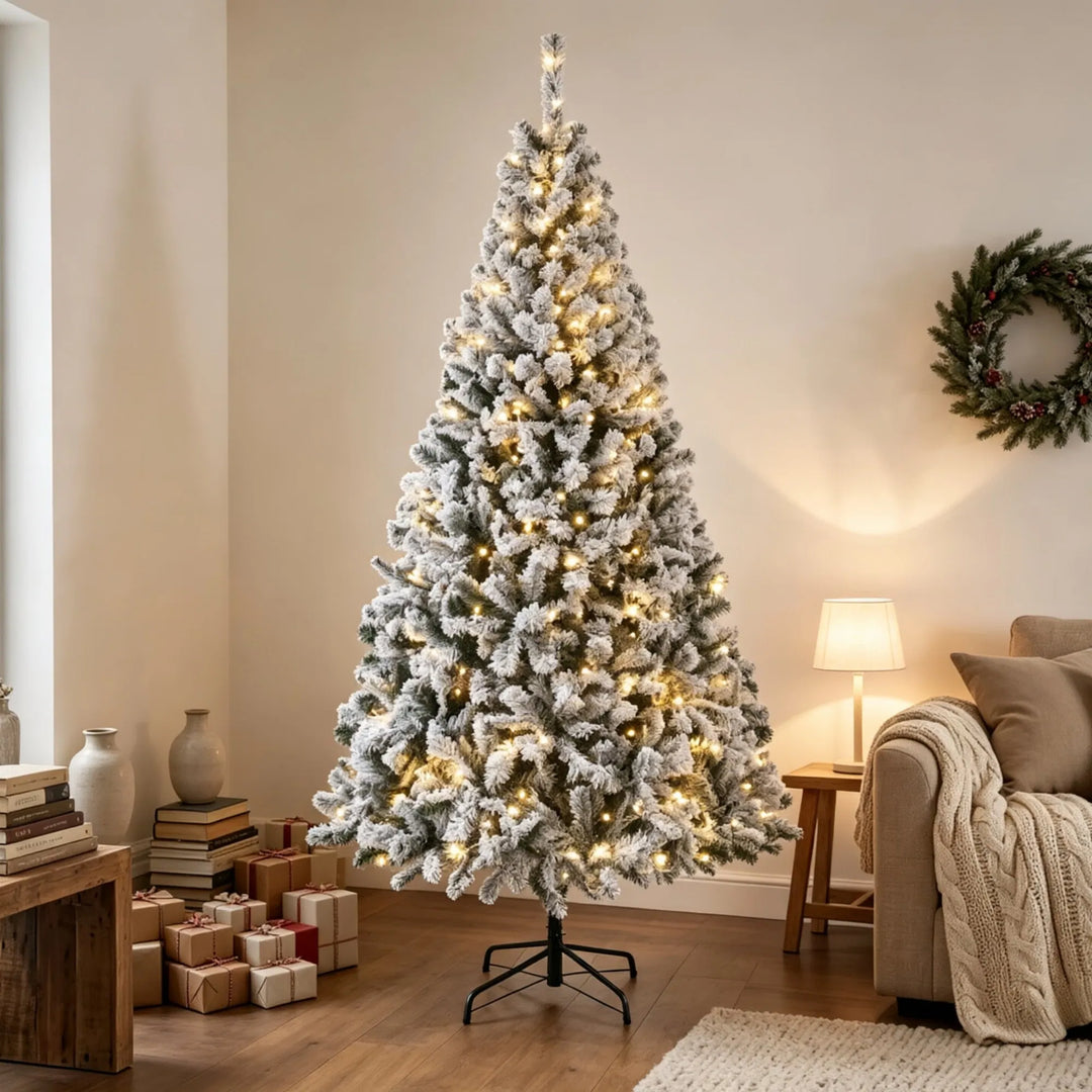 Tall flocked fir with warm lights