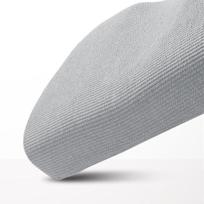 Grey memory foam pillow with knitted cover