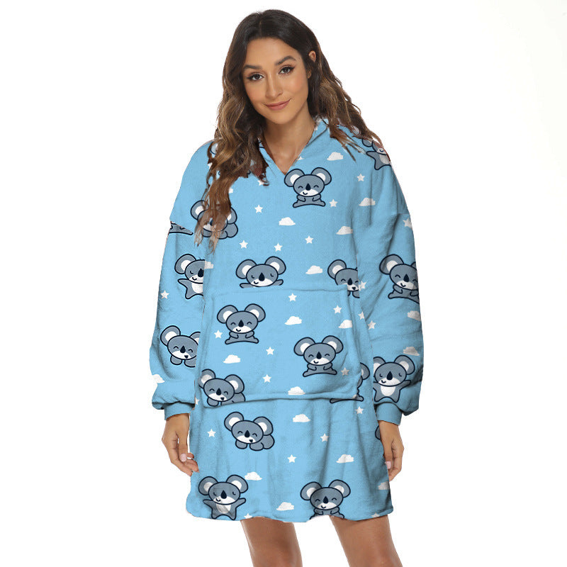 Person wearing oversized panda hooded blanket