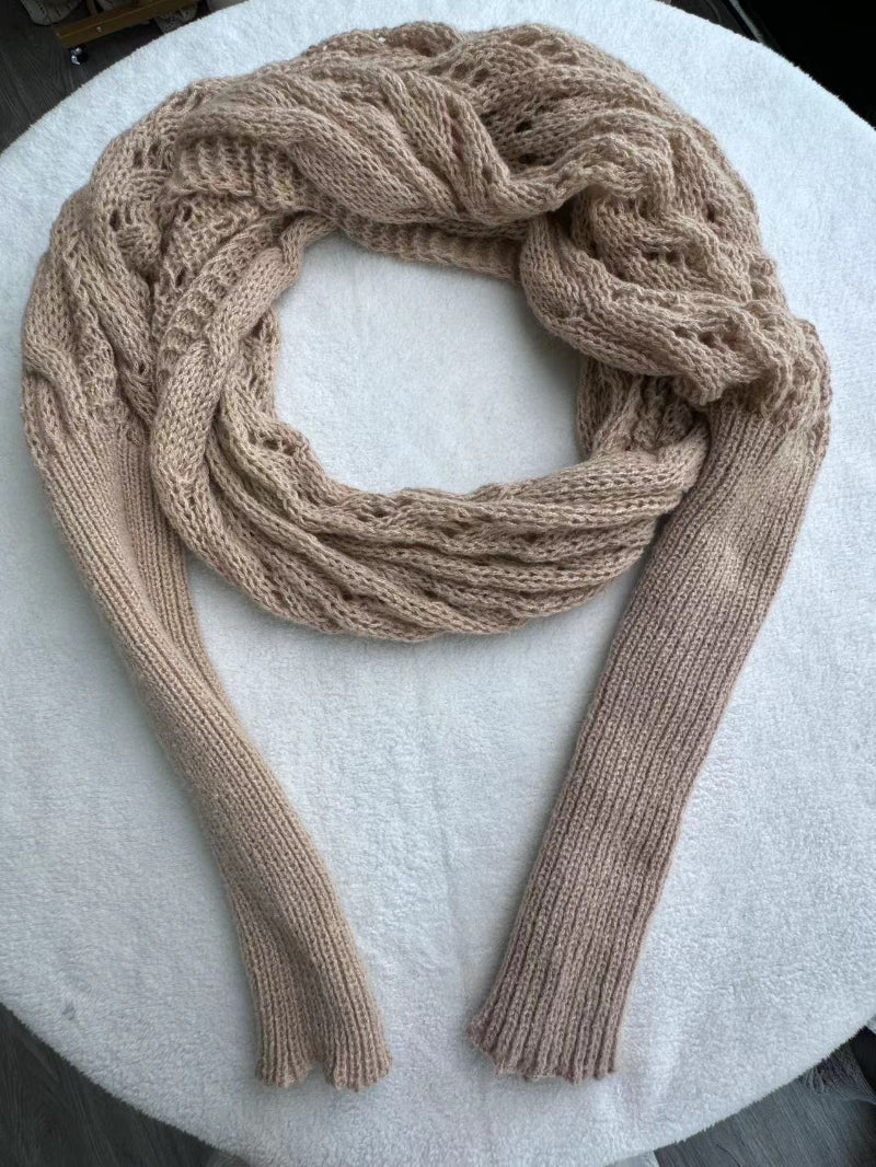 Woman in knitted shrug shawl with sleeves