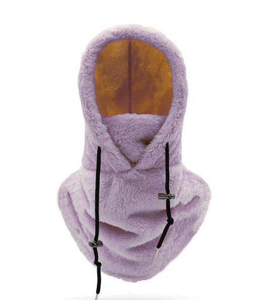 Woman wearing beige plush hood with scarf