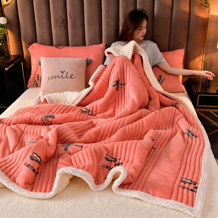 Quilted sherpa blanket with green daisy print