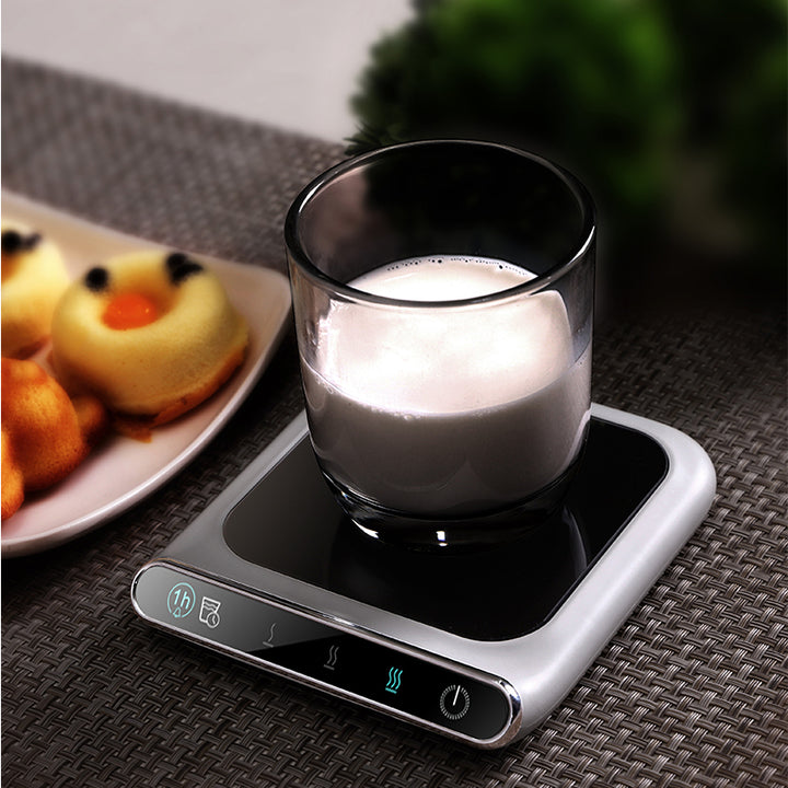 White glass cup warmer coaster with mug