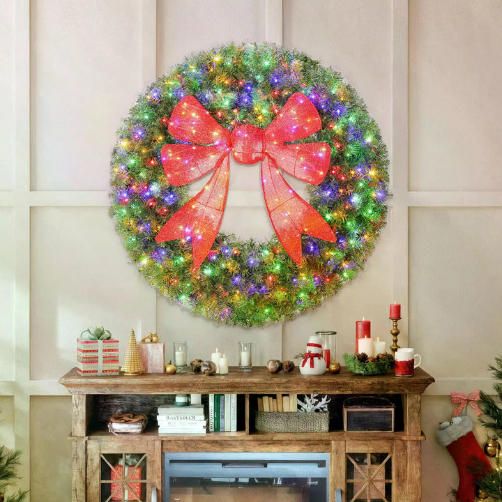 Giant lit Christmas wreath with red bow