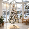 Flocked Fraser fir with warm lights