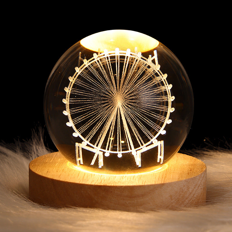 Glowing crystal ball lamp on wood base
