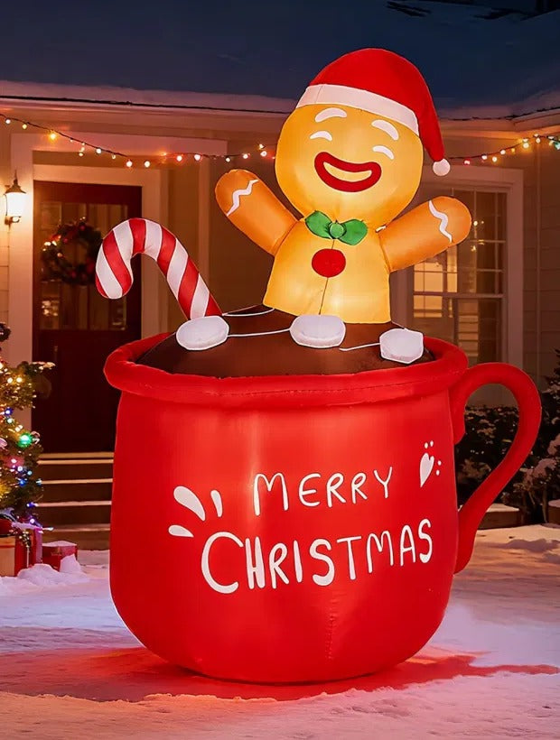Inflatable gingerbread man in a cocoa mug