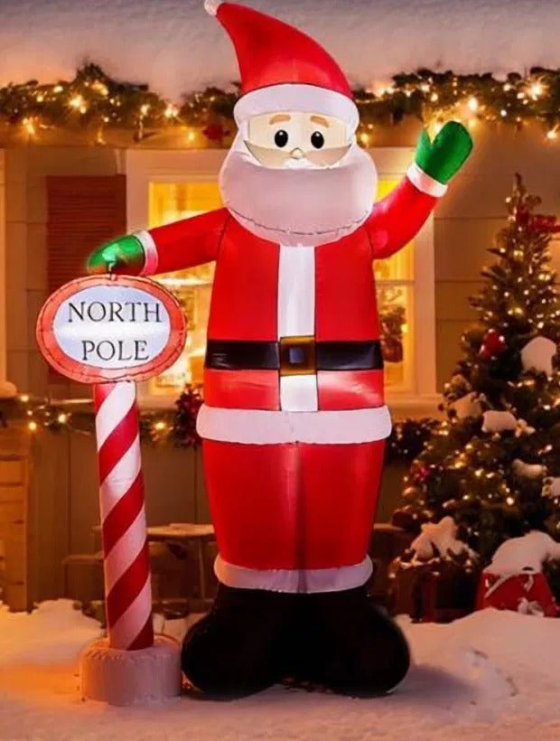 Giant inflatable Santa by North Pole sign