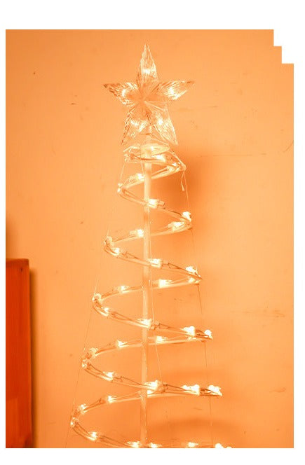 Glowing spiral Christmas tree light outdoors