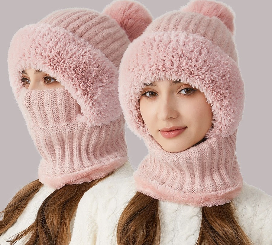 Woman wearing knitted hood with scarf