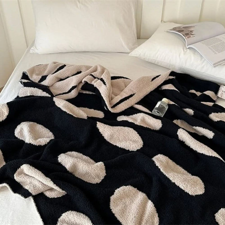 Harwelton™ Reversible Polka Dot Fleece Blanket in Black and White