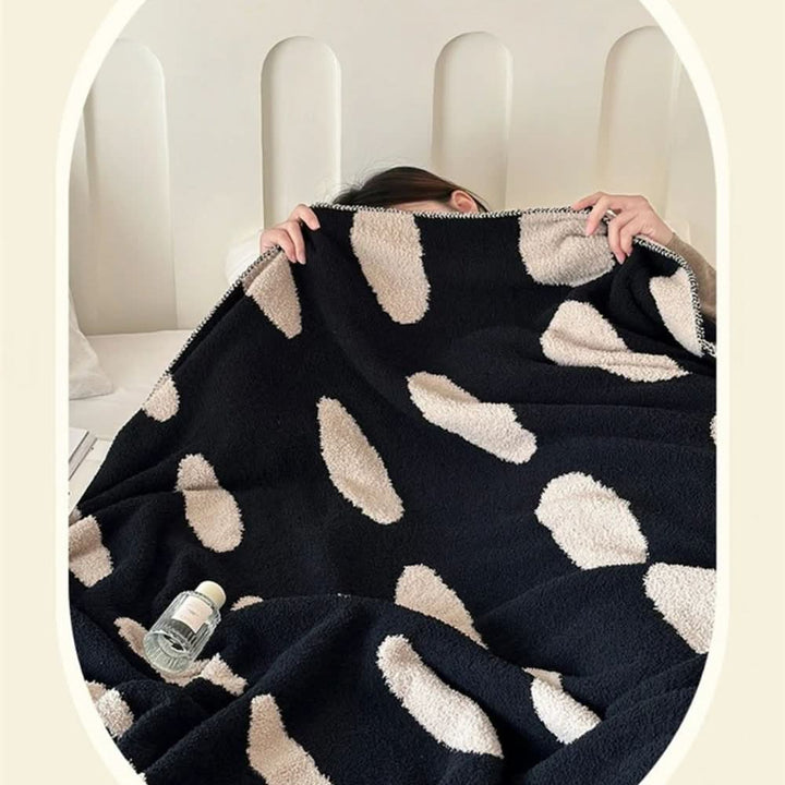 Harwelton™ Reversible Polka Dot Fleece Blanket in Black and White