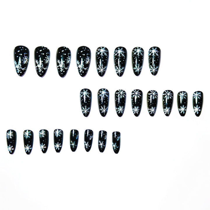 Winter Snowflake Nail Art Design on a Glossy Black Base