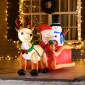 Inflatable Santa sleigh with reindeer and snowman