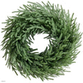 Large green pine wreath on vine base