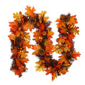 Autumn maple leaf garland on a mantel