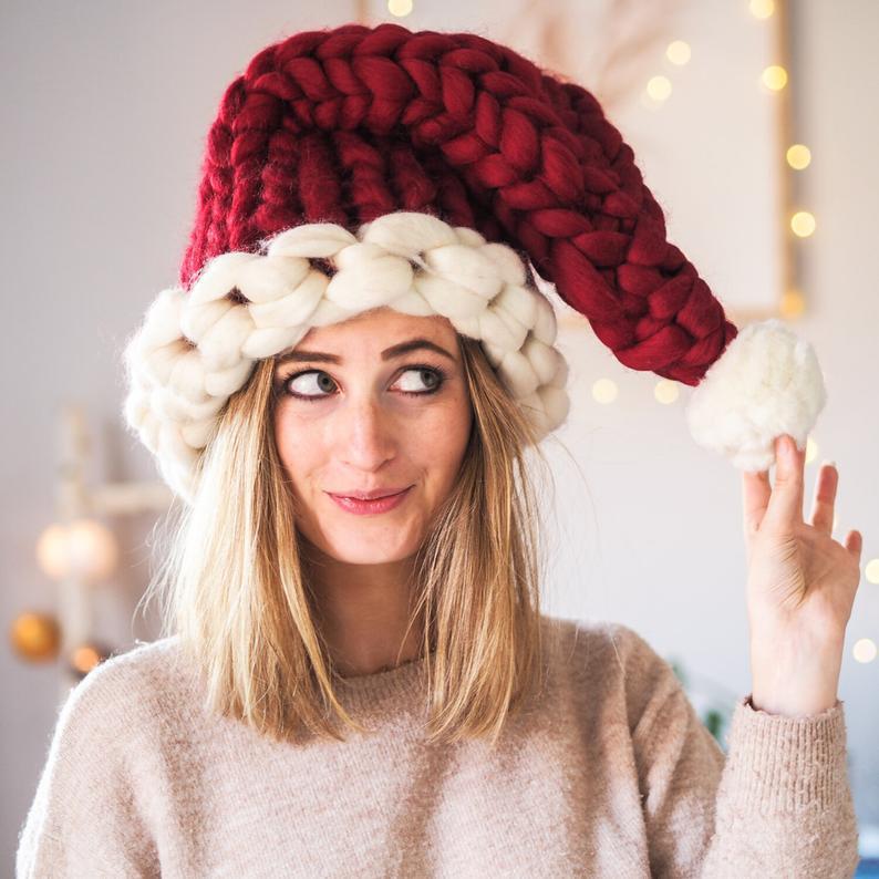 Red chunky knit Christmas hat with white pompom