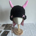 Black crochet bucket hat with pink horns