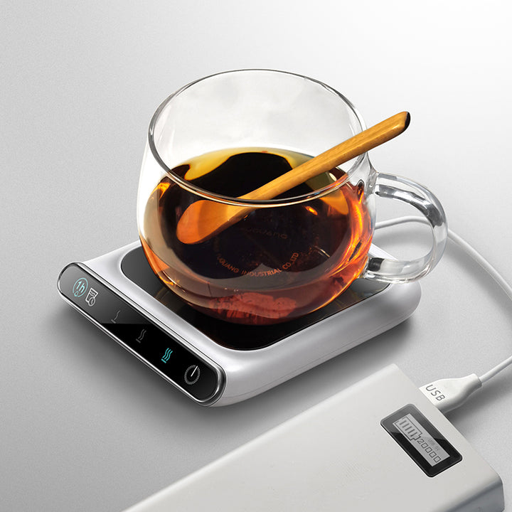 White glass cup warmer coaster with mug