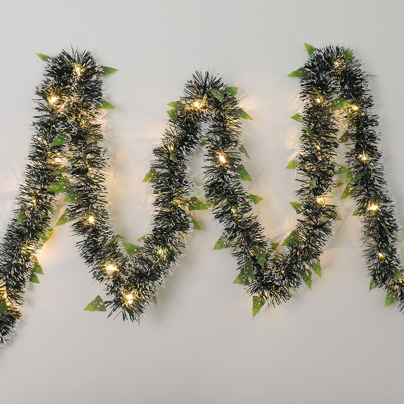 Tinsel Christmas garland with lights and Santas