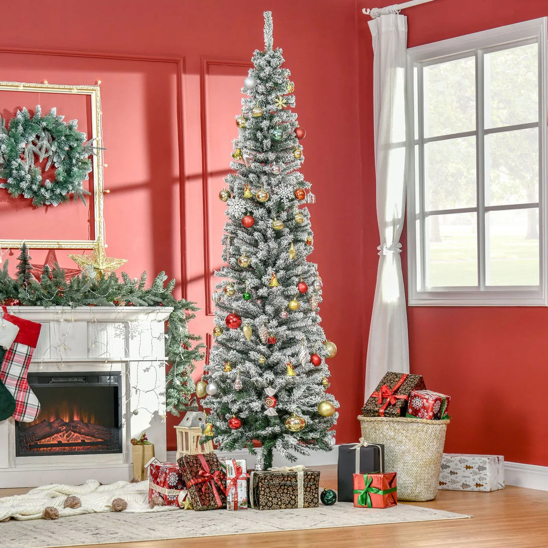 Tall slim snow-flocked tree, unlit